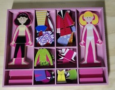 Melissa and Doug Magnetic Dress Up Abby and Emma 56 magnetic pieces stands