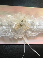 NEW WEDDING GARTER, FROM LOCAL WEDDING SHOP, NOW CLOSED. MANY LISTED. GRY-99-50