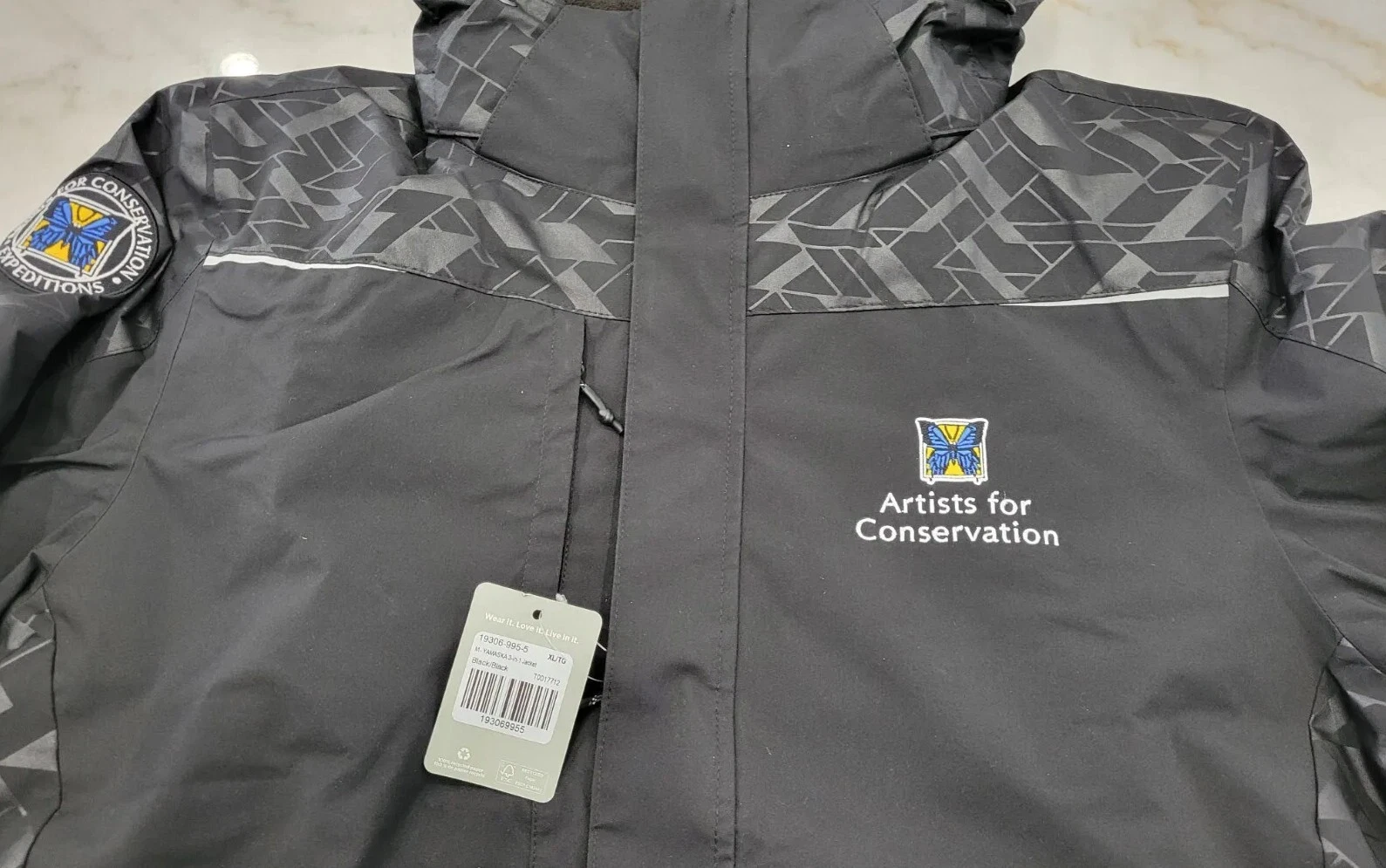 Trimark XL Mens Black Artists for Conservation Karmine Shell Water Proof Coat - product detail image 6