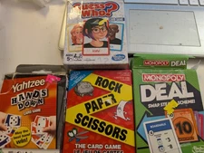 Travel Games, Yahtzee Hands Down, Monopoly Deal, Guess Who, Rock Paper Scissors