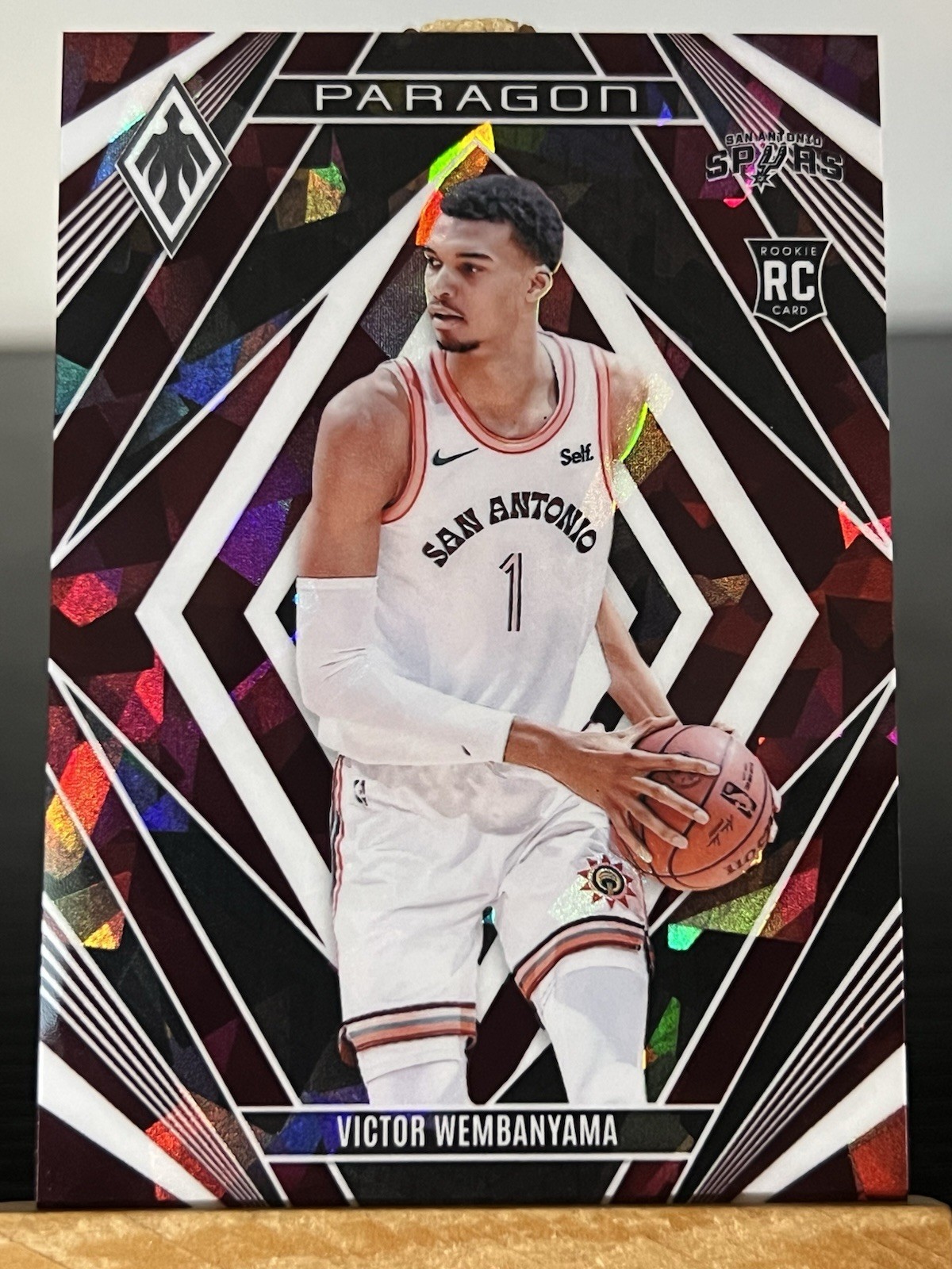 2023-24 Panini Phoenix Paragon Rookie Victor Wembanyama #13 Maroon Ice /275 (RC)