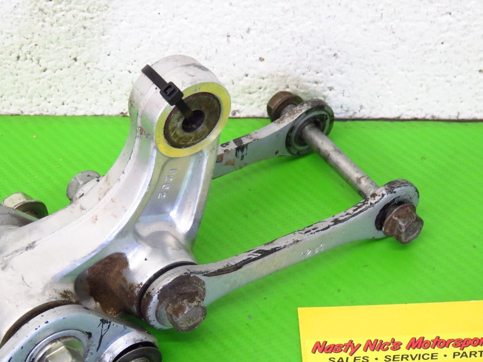 04 Kawasaki KX100 Kx 100 REAR SHOCK LINKAGE link dog leg swing arm