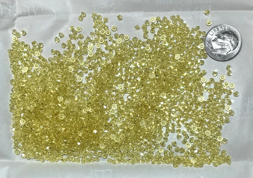 Cuentas bicónicas de cristal Swarovski® #5328 - 2,5 mm - JONQUIL - Paquete de fábrica Foto 3 de 4