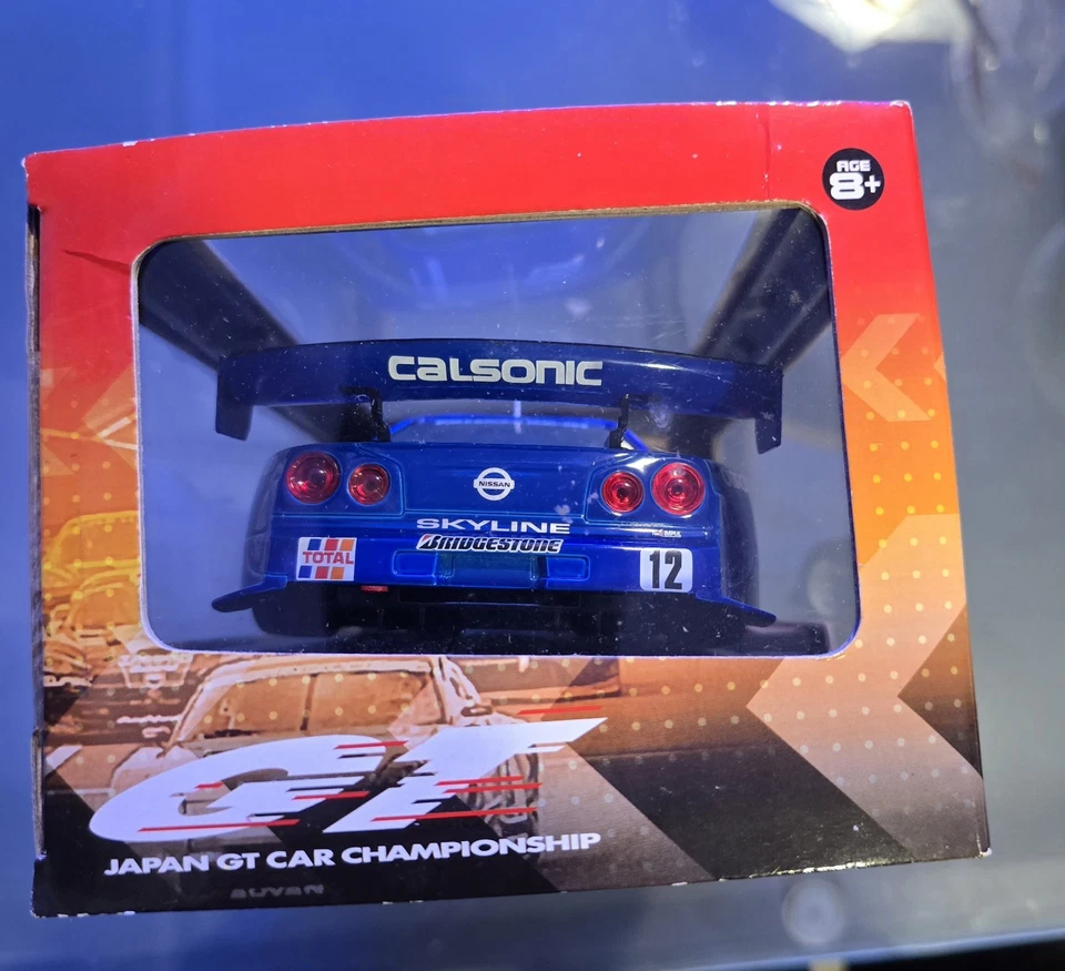 DIECAST MUSCLE MACHINES NISSAN GT-R CALSONIC SKYLINE 2003 SERIES 1:24 VGC - Image 4 of 4