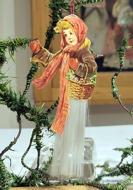 Girl delivering Holly. Smaller 1890s Paper & Spun Glass German Ornament.