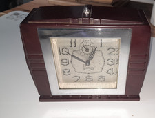 Réveil pendule en bakelite marron , de la marque BLANGY  FRANCE   BAYARD