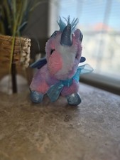 Small Multicolor Unicorn Stuffed Animal with Glitter Hooves, Bow, and Wings