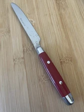 Stainless JUBILEE? RED Plastic Handle Silver Rivets Tip DINNER KNIFE 8.75”