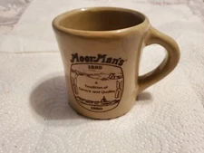 Monmouth stoneware coffee mug moormans feed 1885-1980 service and quality farm 