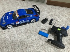 CALSONIC NISSAN SKYLINE 2007 RC CAR REMOTE SET 1:10 EXCELLENT RUNNING