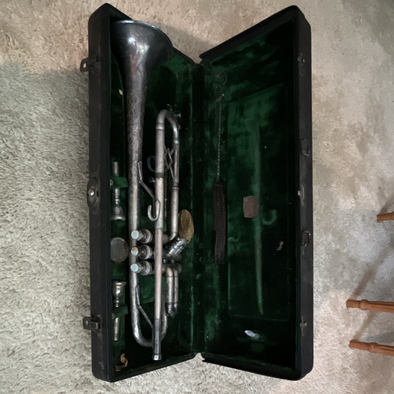 This is a vintage King Liberty trumpet produced by the H.N. White Company