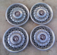 75-85 Cadillac Fleetwood Deville Wire Hubcaps No Key 75-85 Cadillac Fleetwood Deville Wire Hubcaps No Key