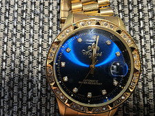 Ascania Damen Automatik Armbanduhr Gold Blau Datum Sichtboden 3 ATM