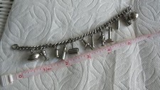 PULSERA vintage con dije de béisbol, fútbol americano, teléfono, bala, cáliz