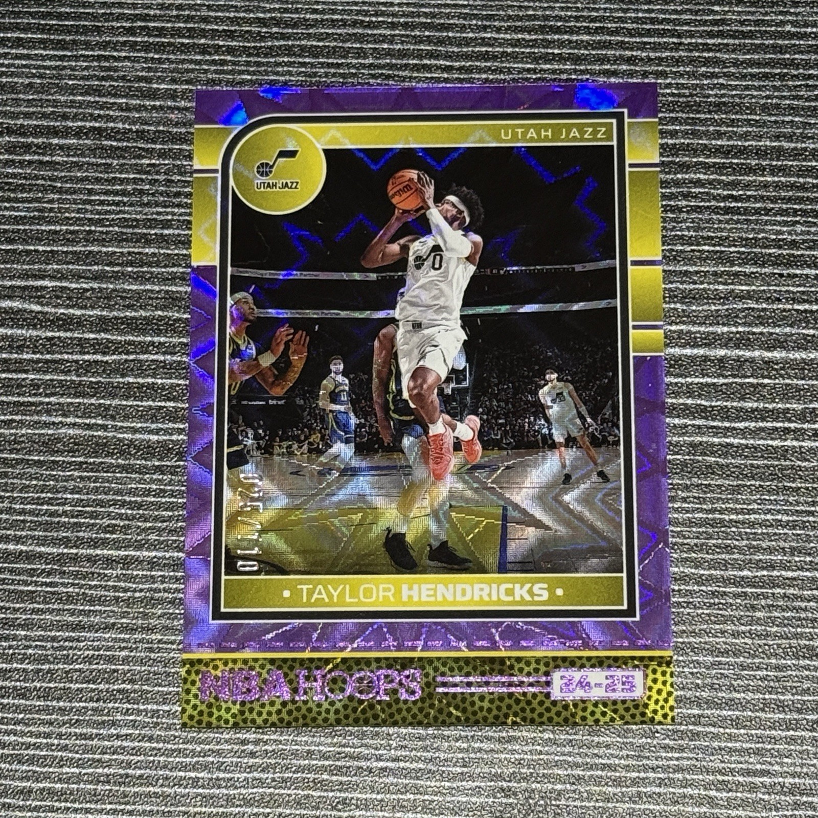 2024-25 Panini NBA HOOPS Taylor Hendricks #72 Purple Explosion 25/110
