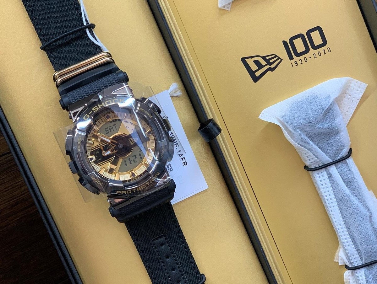 Casio G-Shock GM-110NE-1A New Era - Bracelet Doré Digital/analogique - Neuf Avec étiquettes