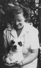 1950s Woman Holding Cute Dog Smiling Glasses Beloved Best Friend