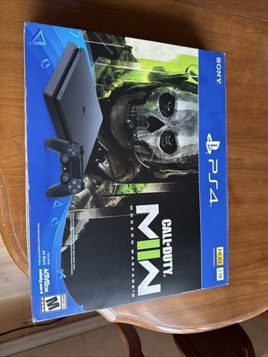 Sony PlayStation 4  Black Used Once All Games Sealed Except Call of Duty