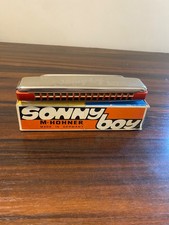 Vintage Hohner Sonny Boy M harmonica, made in Germany, in original packaging.