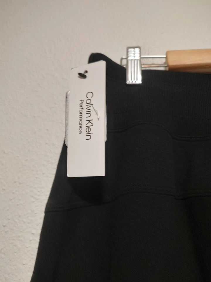 Черные тренировочные штаны Calvin Klein Performance с широкими штанинами и открытыми манжетами размер 1X - Изображение 3 из 4