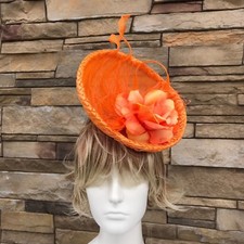 Orange Fascinator Hat.Handmade in NY. Derby,Wedding. One size Fits all.