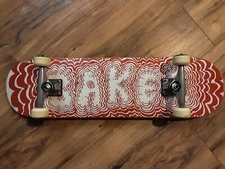 BAKER Theotis "Ink Wasters" complete skateboard with OJ's and Dogtown trucks