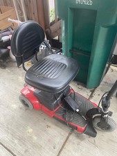 red electric scooter with seat