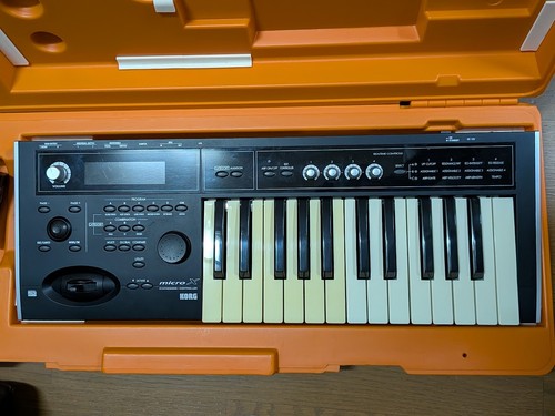 Used Korg micro X synthesizer/controller Black with case, power supply