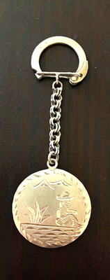 Vintage 925 Keychain with Man in Sombrero Sitting Outside