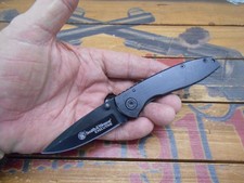 Smith  Wesson Executive Pocket Knife Frame Lock Plain Edge Blade CK110B