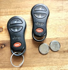 OEM Jeep 2001 Key Fob Set Of Two Model GQ43VT9T Part Number 56036859  3 Button 