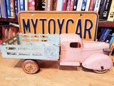 NICE VINTAGE 1930's WYANDOTTE PRESSED STEEL PINK & BLUE EASTER BUNNY STAKE TRUCK