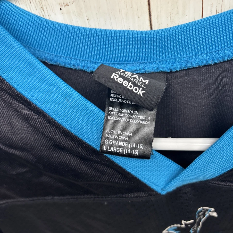 Camiseta de futebol americano Carolina Panthers Steve Smith Reebok NFL tamanho Youth L 14-16 preta - Imagem 3 de 4