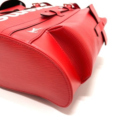 louis vuitton christopher backpack pm red X SUPREME Epi This new compact version of the christopher backpack features all of the refined details of the larger model LOUIS VUITTON Christopher PM Black