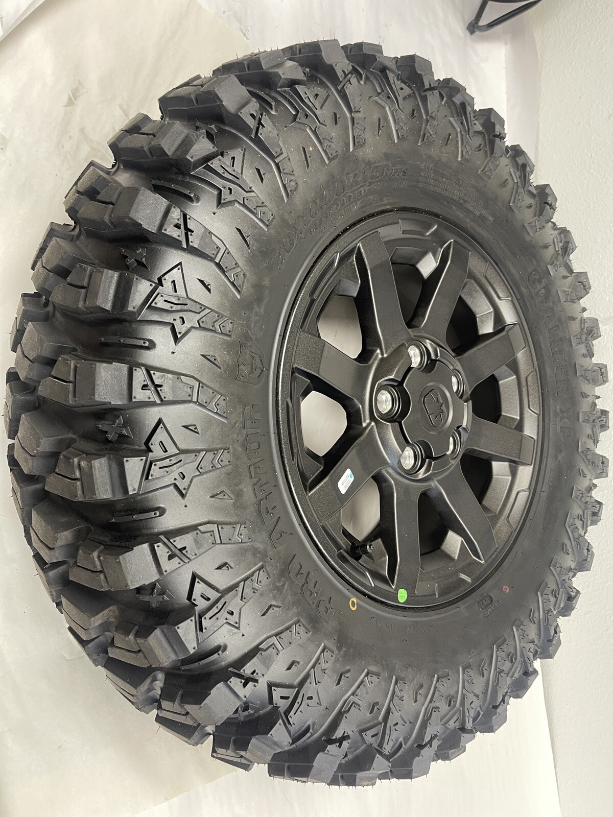 12024 POLARIS XPEDITION FRONT WHEEL AND TIRE 30X10x15 PRO ARMOR