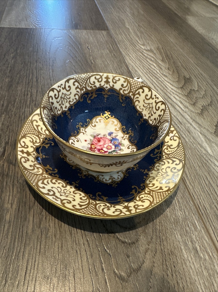 VINTAGE CROWN STAFFORDSHIRE TEA CUP SAUCER SET BLUE GOLD FLORAL