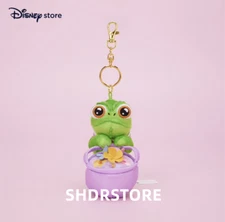 Disney store authentic 2025 rapunzel pascal small plush flower keychain
