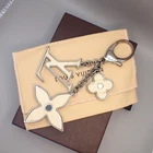 LOUIS VUITTON Logo Bijoux Sac Fleur De Epi Bag Charm Silver Ivory 69KD231