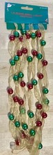 BEAUTIFUL RED AND GREEN BEADS HAND STRUNG ON A RIBBON GARLAND  9  LONG 
