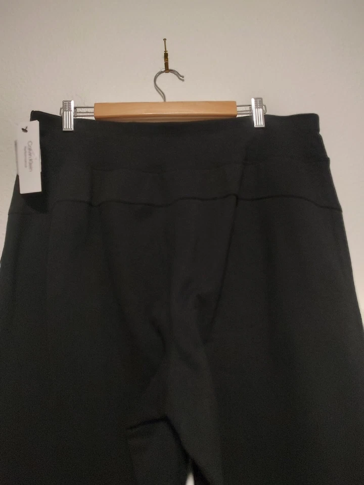 Черные тренировочные штаны Calvin Klein Performance с широкими штанинами и открытыми манжетами размер 1X - Изображение 4 из 4