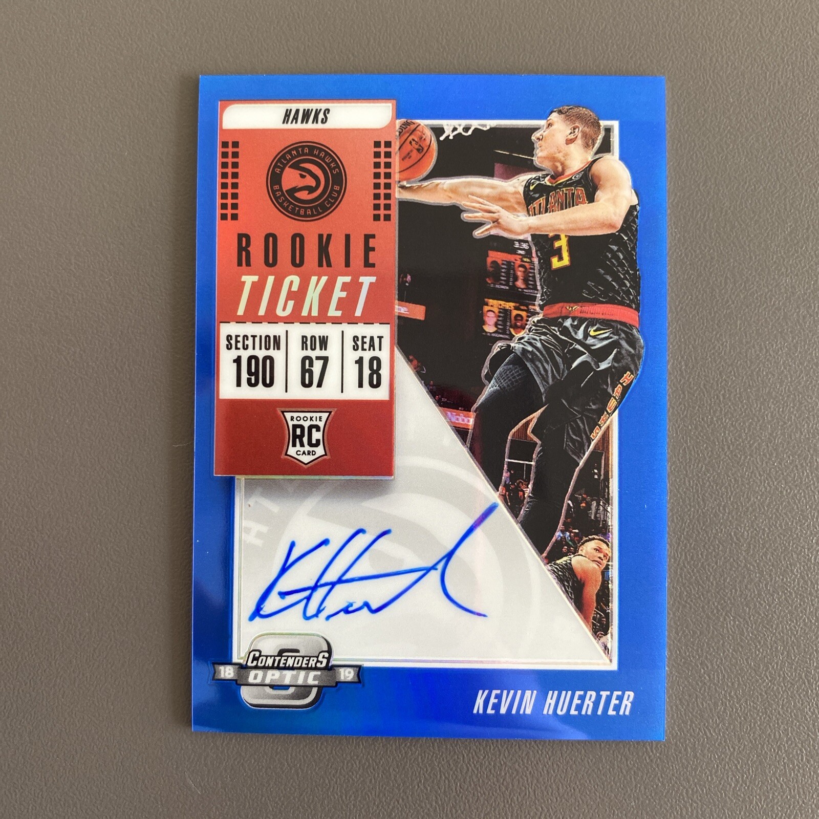 2018-19 Panini Contenders Optic Kevin Huerter Rookie Blue Ticket Auto 12/99