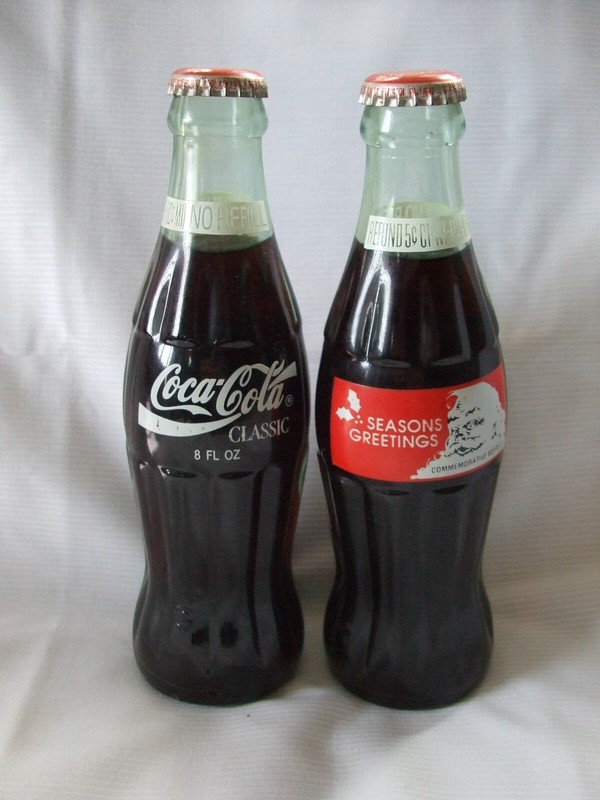 2- 8oz Full Coca Cola Classic Commemorative Seasons Greetings  refund Bottle 