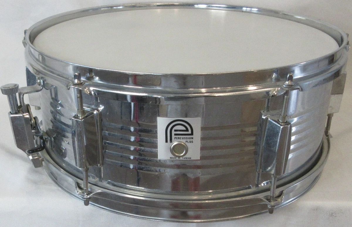 Percussion plus snare drum outlet
