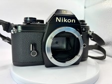  For Parts or Repair Nikon EM 35mm SLR Film Camera Body Tested Shutter IssueDDU