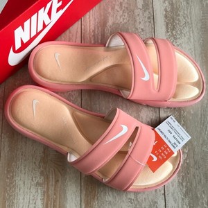 peach nike slides