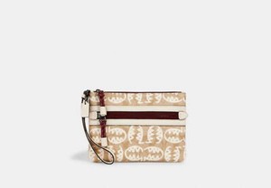 terrain crossbody in signature canvas with rexy by guang yu