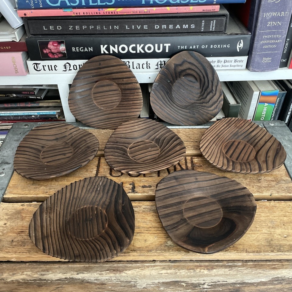 Witco-style burnt wood tiki coasters/saucer plates are chunky, primitive-chic MCM artifacts that look insane on a tiki bar shelf.