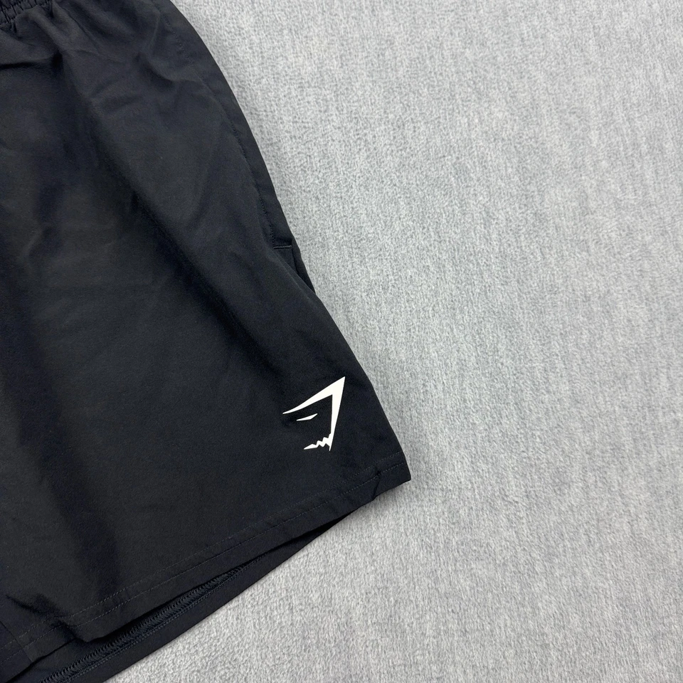 Pantalones Cortos Gymshark Para Hombres Pequeños Negros Llegada 5" Calce Ajustado Atlético Gimnasio Correr Activo Foto 2 de 4