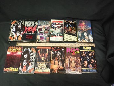 Lot of 12 VHS Tapes based around the classic rock band KISS
