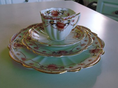 Antique Bone China tea set, four places & sandwich plate.